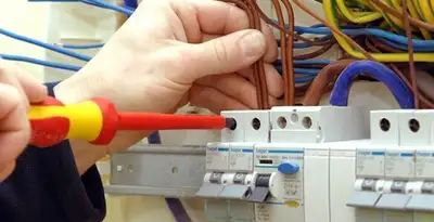 electrician services performing professional electrical panel wiring and connections in Spokane, WA