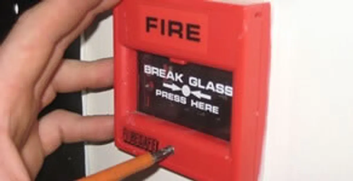 fire alarm installation service showing manual fire alarm pull station installed by licensed electricians in Spokane, WA