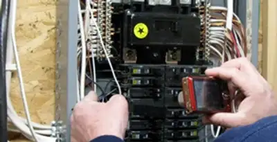 Home electrical inspection of circuit breaker panel by licensed electrician in Spokane, WA