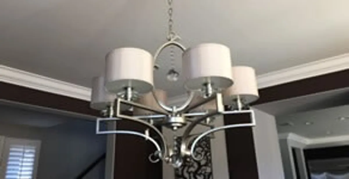 Modern chandelier installation with multiple light fixtures in Spokane, WA
