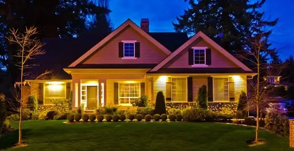security light installation services illuminating a residential exterior at night in Spokane, WA