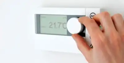 Thermostat installation service with professional adjusting temperature control in Spokane, WA