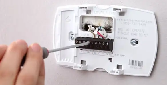 Thermostat installation service with proper wiring and secure wall mounting in Spokane, WA